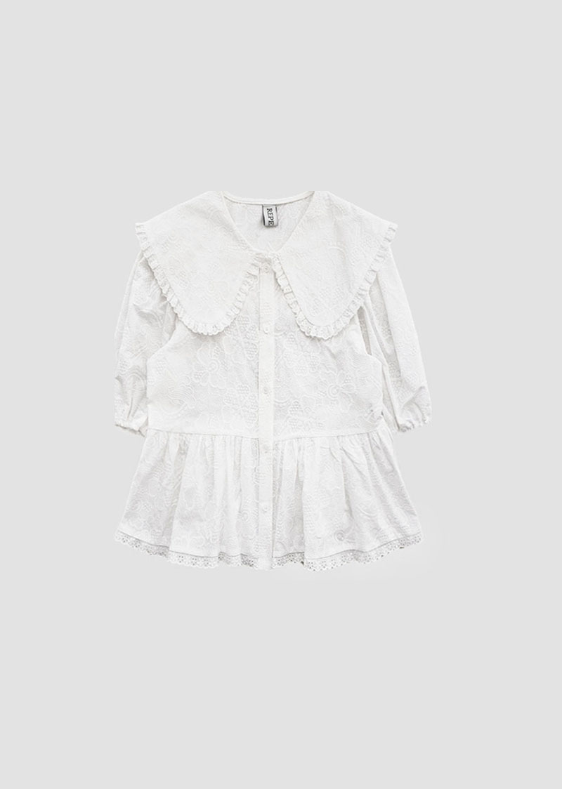 Embroidered frill blouse